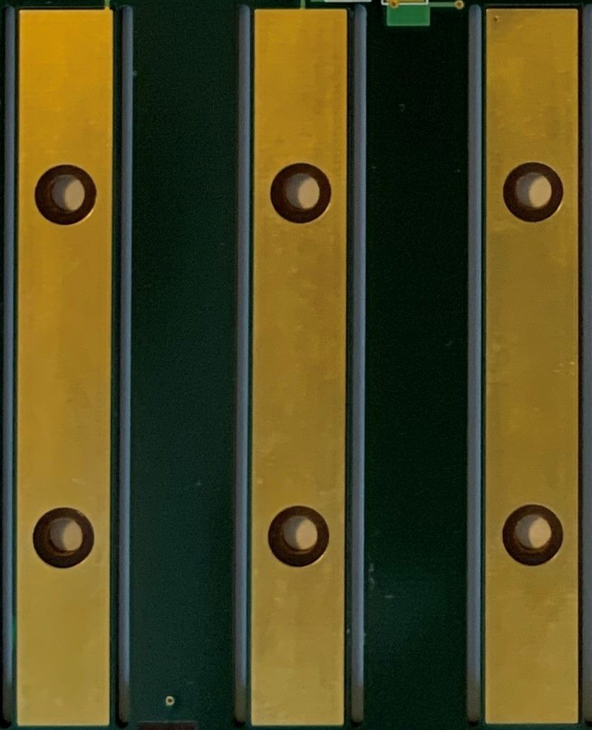 A close up of the metal bars on a fence.